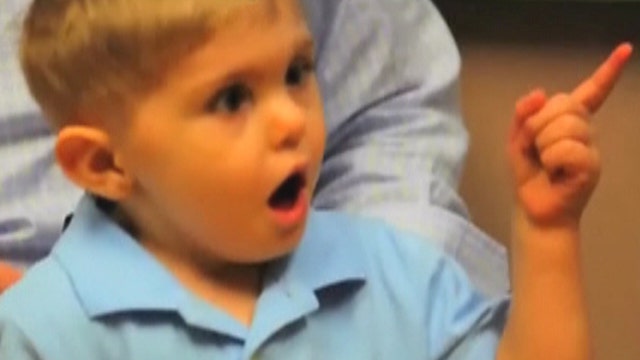 Deaf child hears dad's voice for very first time