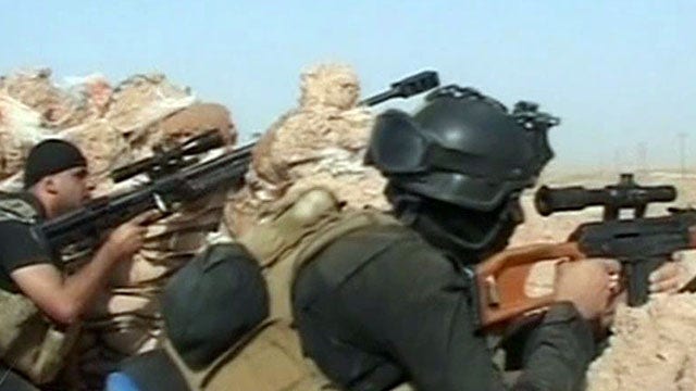 Militants capture parts of Western Iraq; ISIS threat mounts