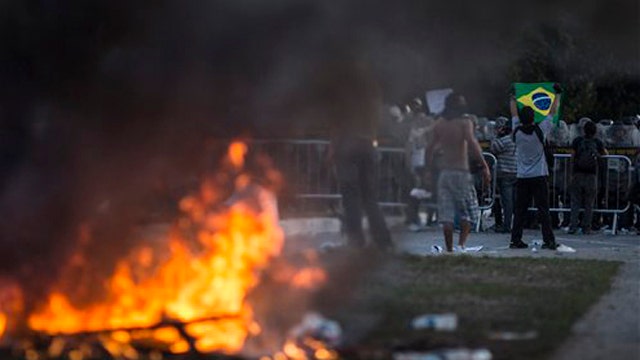 Condoning violence? Union boss endorses Brazilian riots