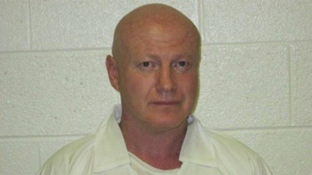 Manhunt underway in Arkansas for escaped murderer