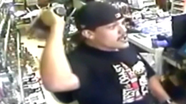 Bottle tossing crook attacks clerk in liquor store robbery