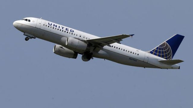 Evacuation slide deploys midair during United flight