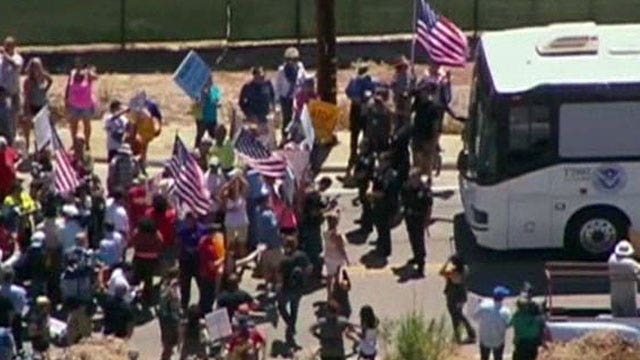 Protesters block buses carrying illegal immigrants