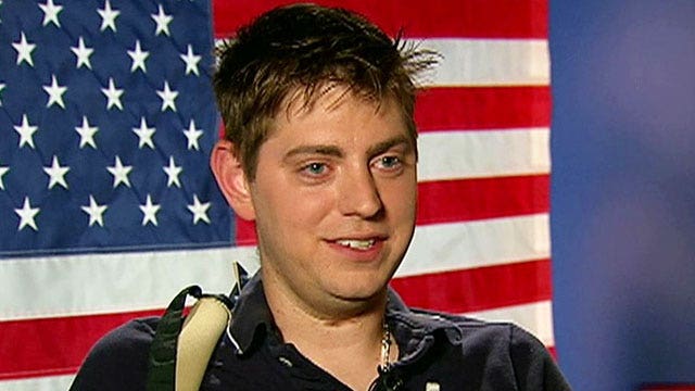 Wounded warrior gears up for double arm transplant