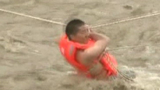Rescuers rush to save man trapped on small island in China