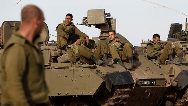 Israel’s cabinet authorizes 40,000 reserve troops 