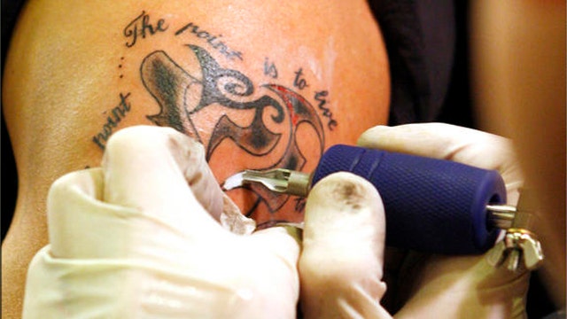  'Outnumbered Overtime': What message do tattoos send?