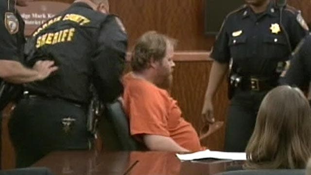 Man accused of killing ex-wife's family collapses in court
