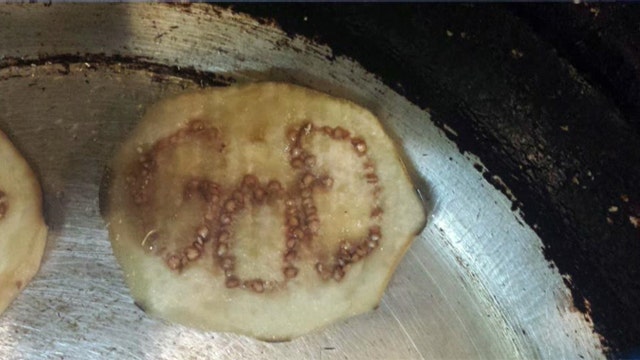 Cook finds divine message in sliced eggplant