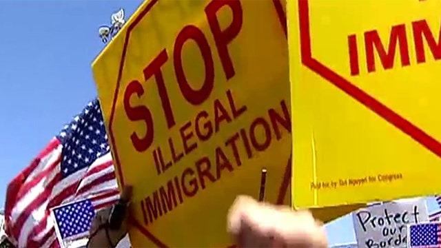 Protesters rally to block plans to house illegal immigrants