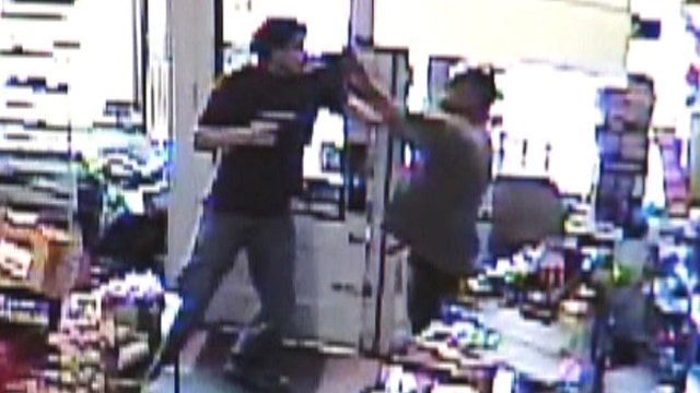 Convenience store clerk fights off robbery suspect