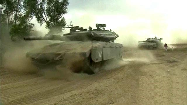 Israeli troops gain ground in push into Gaza