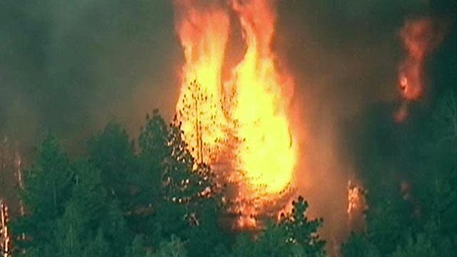 Thousands evacuate as Calif. blaze spreads