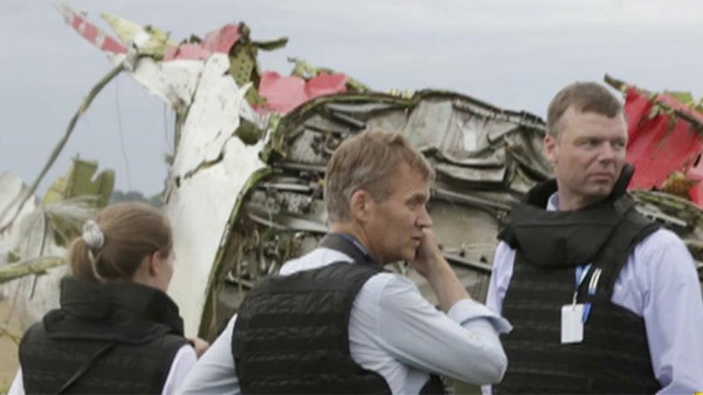 Search for answers in the MH17 crash begins