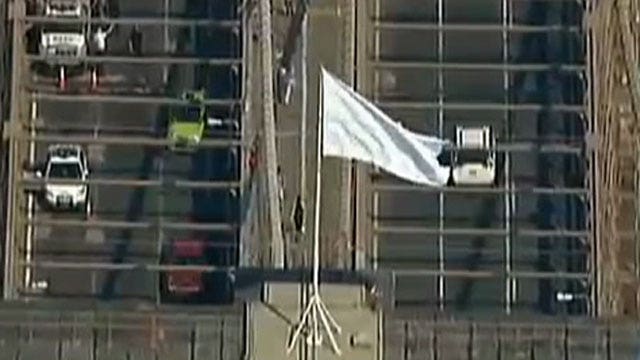 Investigation into tampered flags on Brooklyn Bridge