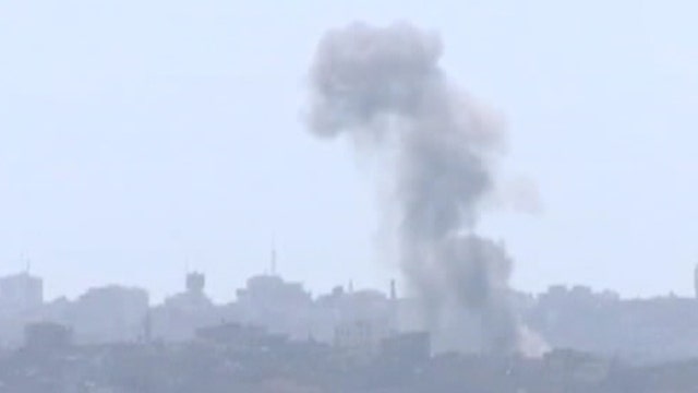 Israeli, Hamas forces fight despite cease-fire calls