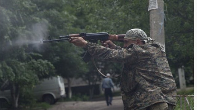 Fighting rages in Ukraine as US steps up Russia sanctions