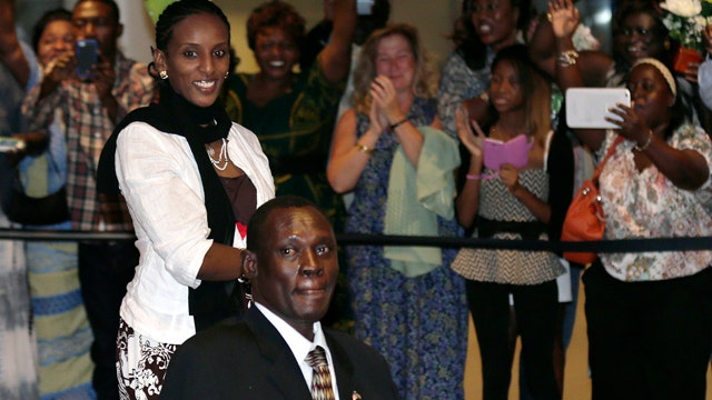 Sudanese woman who faced death penalty arrives in US