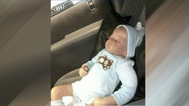 EMT smashes car window to save baby... doll