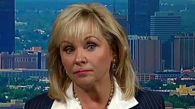 Gov. Fallin: Stop secrecy about illegal minors in US