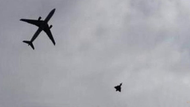 Fighter jets escort passenger plane to Manchester Airport