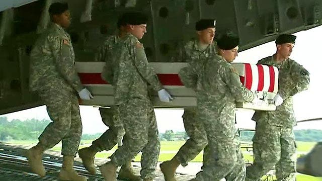 Body of Maj. Gen. Harold Greene arrives at Dover AFB
