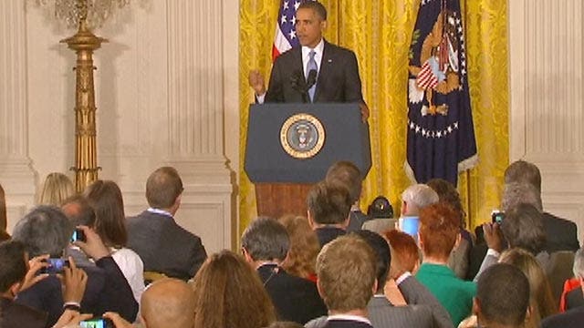 President Obama faces the White House press corps