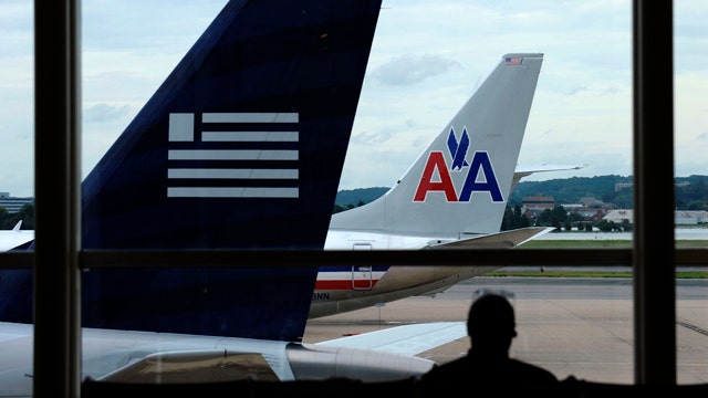 DOJ sues American Airlines, US Airways over merger
