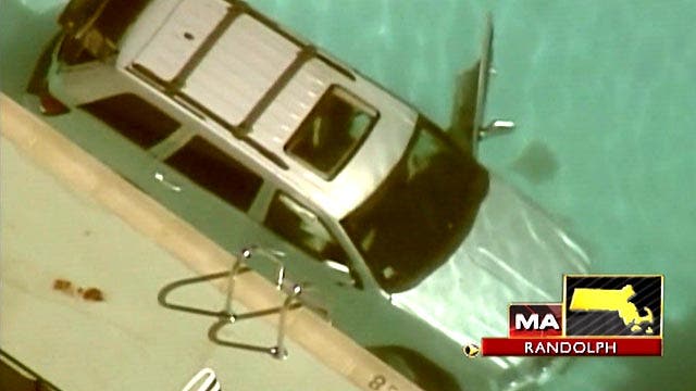 Mass. woman dies after SUV crashes into pool