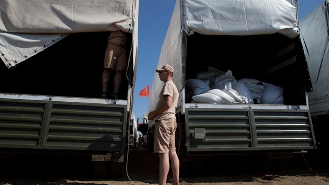 Red Cross inspects Russian aid convoy en route to Ukraine