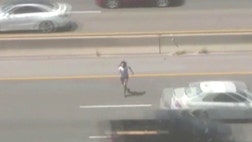 >Woman dodges traffic in Corpus Christi, Texas