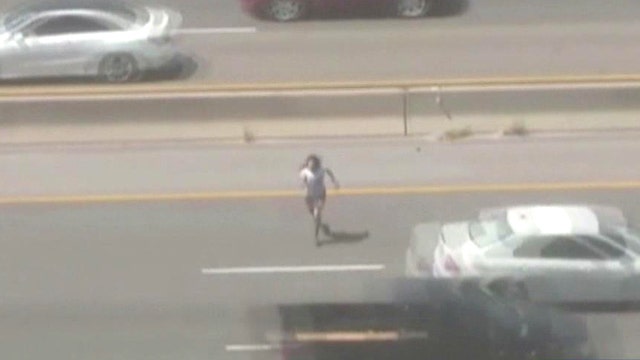 'Frogger' fan? Police chase suspect across highway