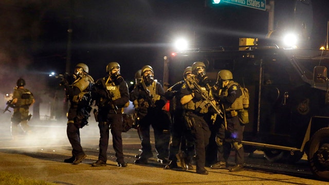 Critics condemn militarization of local police departments