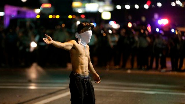 Looting and disorder continue to rock Ferguson