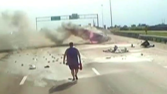 Highway hero: Trucker rushes to save woman, baby from fire