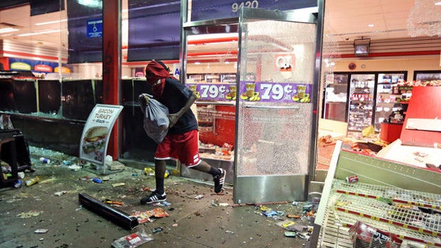 Ferguson biz owners try to pick up pieces in war zone