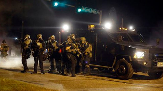 How is the media handling violence in Ferguson? 
