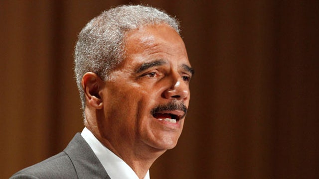AG Holder blasts 'selective release' of Brown case info