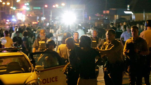 Police arrest 31 as curfew is lifted in Ferguson
