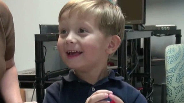 Boy hears mom's voice clearly for the first time