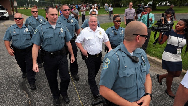 Source: Ferguson officer beaten before shooting Brown