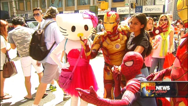 Times Square characters upset at 'hostile' police