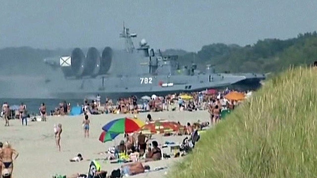 Massive military hovercraft surprises sunbathers in Russia