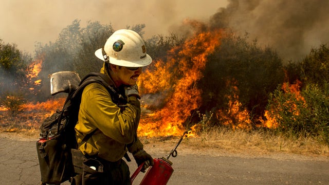 Wildfires rage across the West