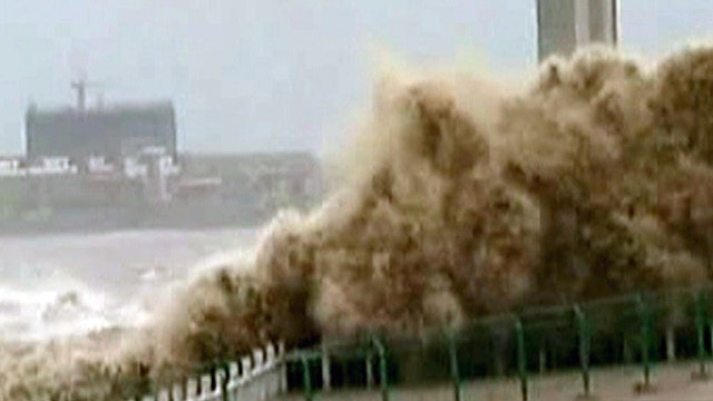 Massive tidal wave slams coastline in China