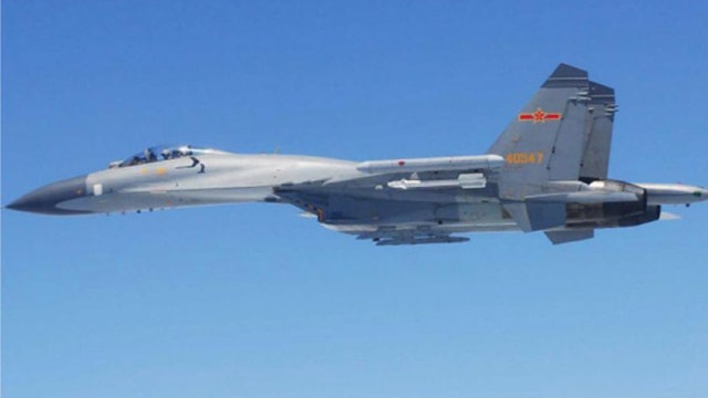 Pentagon: Chinese jet threatened US Navy intelligence plane