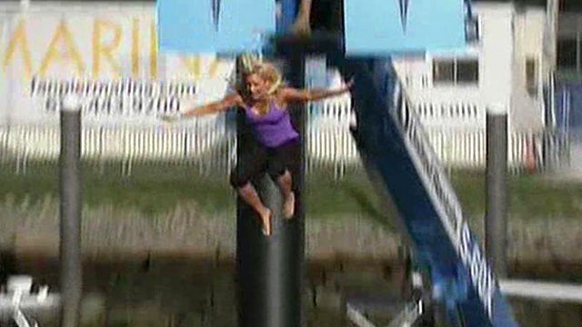 Anna Kooiman takes the plunge into Boston Harbor