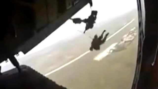 Mid-air scare: Mexican Army paratrooper dragged behind plane