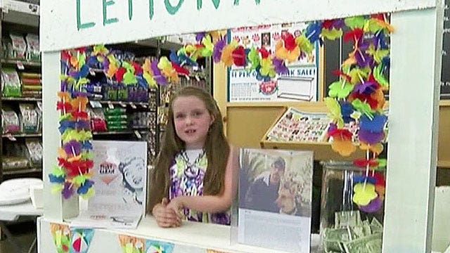 8-year-old raises money for Army veteran and service dog