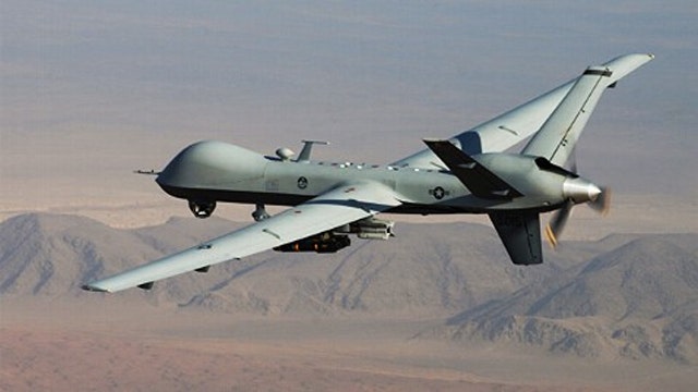 Obama authorizes surveillance flights over Syria
